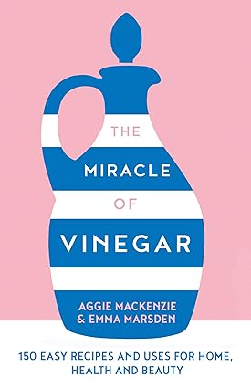 Book cover of 'The Miracle of Vinegar' with a blue vinegar bottle illustration on a pink background.