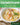 Book cover of 'Chowderland' with a bowl of soup featuring shrimp and vegetables.