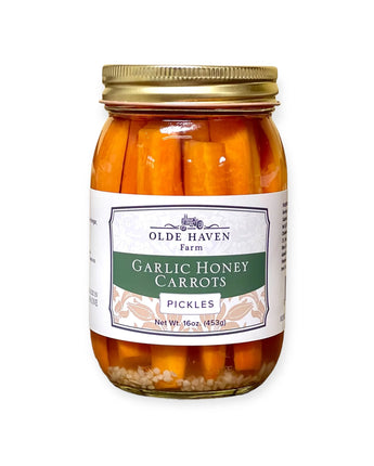 Jar of Olde Haven Garlic Honey Carrots Pickles on a white background