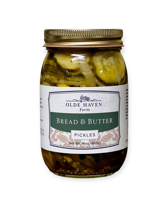 Jar of Olde Haven Farm bread and butter pickles on a white background