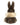 Plush toy with rabbit ears and tail on a white background