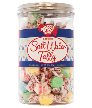 Jar of colorful salt water taffy with a Taffy Town label on a white background