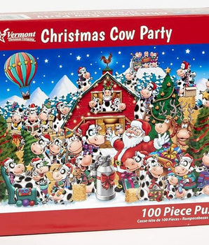 Christmas Cow Party puzzle box with Santa Claus and cows around a barn, featuring Vermont Christmas Company branding.