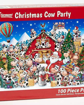 Christmas Cow Party puzzle box with Santa Claus and cows around a barn, featuring Vermont Christmas Company branding.