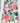 Floral and strawberry patterned towel on a wooden surface