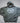 Gray hoodie with 'Old Sturbridge Village' logo on a light gray background