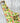 Colorful apron with vegetable pattern on a wooden surface