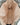 Close-up of the inside of a bag with a beige interior.
