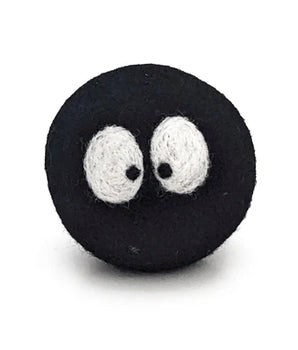 Black ball with white eyes on a white background