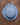 Blue straw hat on a wooden surface